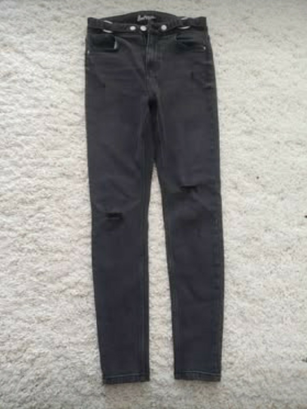 High-Rise Black Skinny Jeans with Subtle Knee Detail